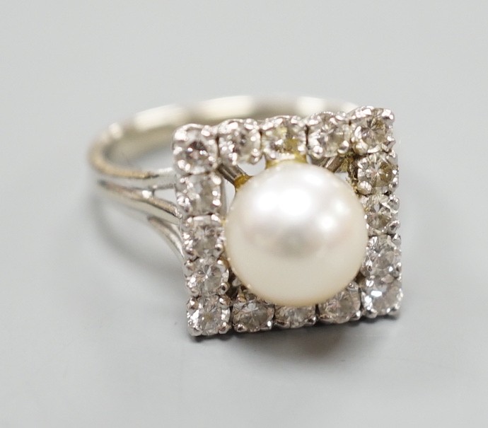 A white metal, cultured pearl and diamond set square cluster ring, size M, gross weight 5.5 grams.